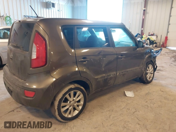 2012 Kia Soul + with VIN KNDJT2A64C7452975, listed as a IAAI auction lot 41635133 with 164,937 mi miles. Bid and sale history available at carsss.com. Image 4.