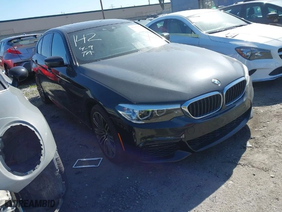 2019 BMW 5 Series 530e iPerformance with VIN WBAJA9C57KB399703, listed as a IAAI auction lot 41219241 with 60,875 mi miles. Bid and sale history available at carsss.com. Image 1.