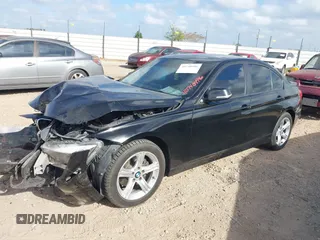 2014 BMW 3 Series 328d xDrive with VIN WBA3D5C53EF147095, listed as a IAAI auction lot 40740496 with 98,834 mi miles. Bid and sale history available at carsss.com. Image 2.