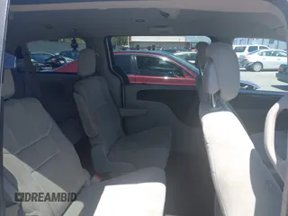 2012 Dodge Grand Caravan SXT with VIN 2C4RDGCG7CR204835, listed as a IAAI auction lot 41948688 with 125,466 mi miles and . Bid and sale history available at DreamBid. Image 8.