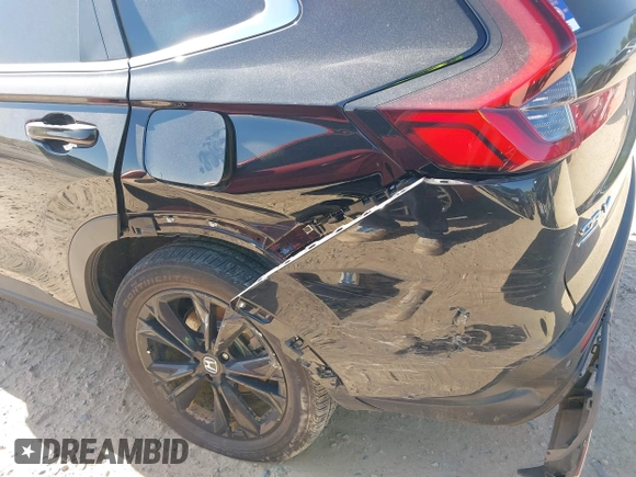 2023 Honda CR-V Sport Touring with VIN 2HKRS6H97PH804042, listed as a IAAI auction lot 42041207 with 19,152 mi miles and . Bid and sale history available at DreamBid. Image 6.