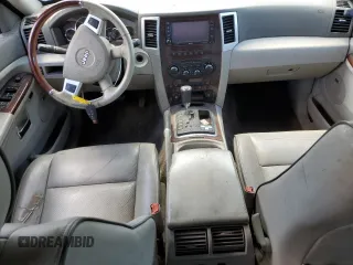 2009 Jeep Grand Cherokee with VIN 1J8HR68T29C512518, listed as a Copart auction lot 58894174 with 113,181 mi miles and Salvage title. Bid and sale history available at DreamBid. Image 8.