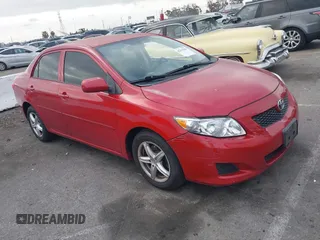 2009 Toyota Corolla with VIN JTDBL40E999058670, listed as a IAAI auction lot 42191508 with 129,398 mi miles and . Bid and sale history available at DreamBid. Image 1.