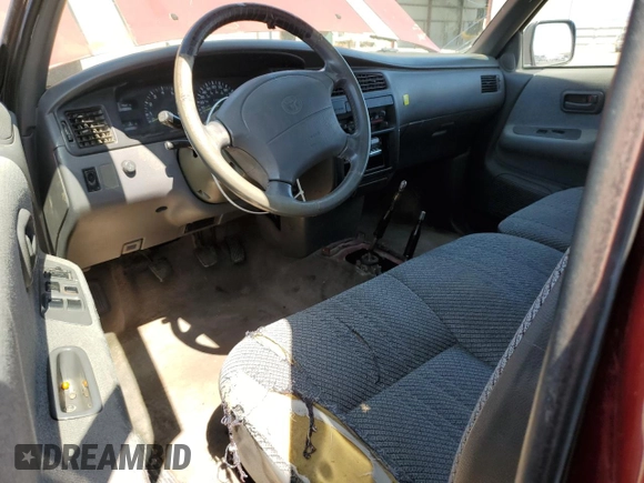 1995 Toyota T100 z VIN JT4VD22F0S0010554, wystawiony jako Copart lot #54718275 z przebiegiem 126 608 mil mil oraz Czysty tytuł • Clean title. Historia ofert i sprzedaży dostępna na DreamBid. Obrazek 8.