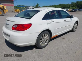 2010 Chrysler Sebring Limited with VIN 1C3CC5FD9AN199621, listed as a IAAI auction lot 42616882 with 110,512 mi miles and . Bid and sale history available at DreamBid. Image 4.