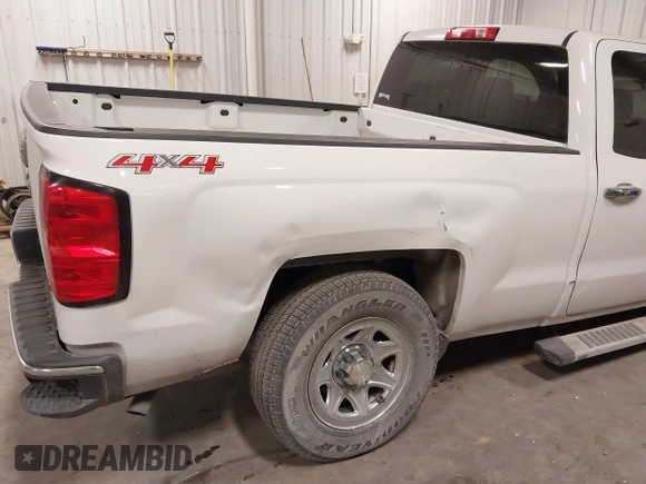 2014 Chevrolet Silverado 1500 Work Truck with VIN 1GCVKPEH5EZ249288, listed as a IAAI auction lot 41479579 with 141,549 mi miles and . Bid and sale history available at DreamBid. Image 18.