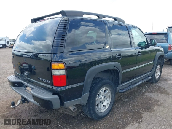 2004 Chevrolet Tahoe Z71 with VIN 1GNEK13ZX4R184775, listed as a IAAI auction lot 42433671 with 77,019 mi miles and . Bid and sale history available at DreamBid. Image 4.