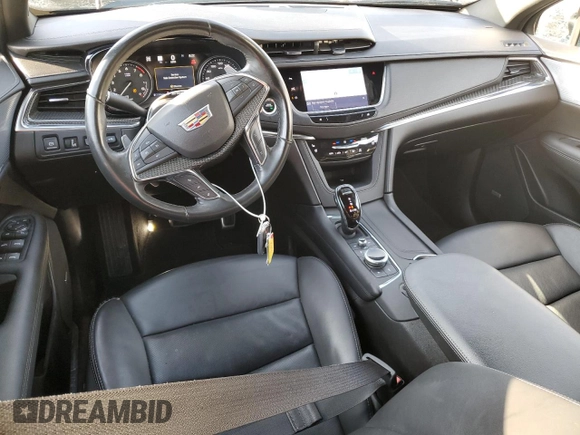 2023 Cadillac XT5 AWD Sport with VIN 1GYKNGRS6PZ131182, listed as a Copart auction lot 49907105 with 38,734 mi miles and Salvage title. Bid and sale history available at DreamBid. Image 8.