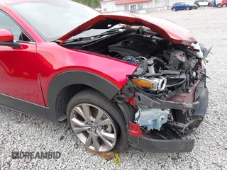 2021 Mazda CX-30 Premium with VIN 3MVDMBDM7MM213754, listed as a IAAI auction lot 42509691 with 61,230 mi miles and . Bid and sale history available at DreamBid. Image 19.