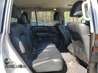 2018 Nissan Armada SL z VIN JN8AY2NC8JX500366, wystawiony jako Copart lot #52125215 z przebiegiem 132 818 mil mil oraz Szkoda całkowita • Salvage title. Historia ofert i sprzedaży dostępna na DreamBid. Obrazek 11.