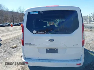 2014 Ford Transit Connect XLT z VIN NM0AE8F7XE1148356, wystawiony jako IAAI lot #41658732 z przebiegiem 128 180 mil mil oraz . Historia ofert i sprzedaży dostępna na DreamBid. Obrazek 16.