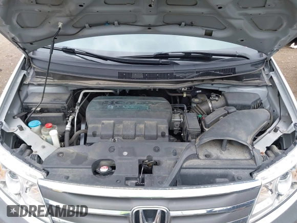 2011 Honda Odyssey LX with VIN 5FNRL5H25BB040287, listed as a IAAI auction lot 42456679 with 129,176 mi miles and . Bid and sale history available at DreamBid. Image 10.