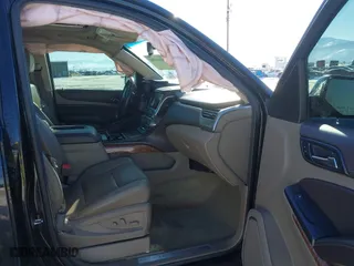 2016 Chevrolet Tahoe LTZ with VIN 1GNSKCKC7GR420945, listed as a IAAI auction lot 41414565 with 134,465 mi miles. Bid and sale history available at carsss.com. Image 5.
