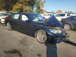 2018 BMW 7 Series 740i xDrive with VIN WBA7E4C53JGV23968, listed as a Copart auction lot 77244814 with 0 mi miles and Salvage Title. Bid and sale history available at carsss.com. Image 4.