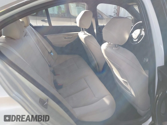 2016 BMW 3 Series 328i with VIN WBA8E9G58GNT47869, listed as a IAAI auction lot 41594120 with 57,561 mi miles. Bid and sale history available at carsss.com. Image 8.