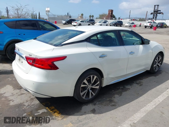 2016 Nissan Maxima S with VIN 1N4AA6AP2GC430689, listed as a IAAI auction lot 41913701 with 132,637 mi miles and . Bid and sale history available at DreamBid. Image 4.