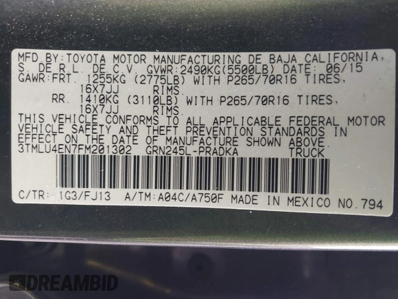 2015 Toyota Tacoma with VIN 3TMLU4EN7FM201302, listed as a IAAI auction lot 41666606 with 200,504 mi miles and . Bid and sale history available at DreamBid. Image 9.