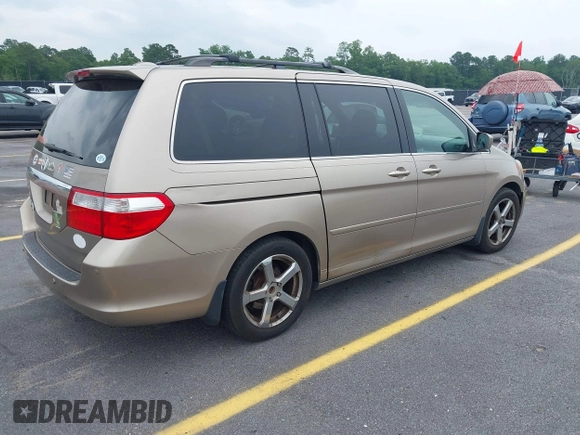 2007 Honda Odyssey Touring z VIN 5FNRL38867B076568, wystawiony jako IAAI lot #42355334 z przebiegiem 211 726 mil mil oraz . Historia ofert i sprzedaży dostępna na DreamBid. Obrazek 4.