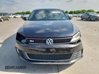 2014 Volkswagen Jetta GLI Edition 30 z VIN 3VW4S7AJ1EM390796, wystawiony jako Copart lot #61292085 z przebiegiem 138 224 mil mil oraz Czysty tytuł • Clean title. Historia ofert i sprzedaży dostępna na DreamBid. Obrazek 5.