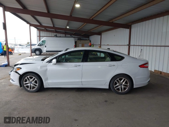2016 Ford Fusion SE with VIN 3FA6P0H71GR386404, listed as a IAAI auction lot 41974062 with 104,018 mi miles. Bid and sale history available at carsss.com. Image 15.