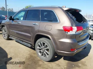 2017 Jeep Grand Cherokee Overland z VIN 1C4RJECG0HC960178, wystawiony jako IAAI lot #42315844 z przebiegiem 63 271 mil mil oraz . Historia ofert i sprzedaży dostępna na DreamBid. Obrazek 3.