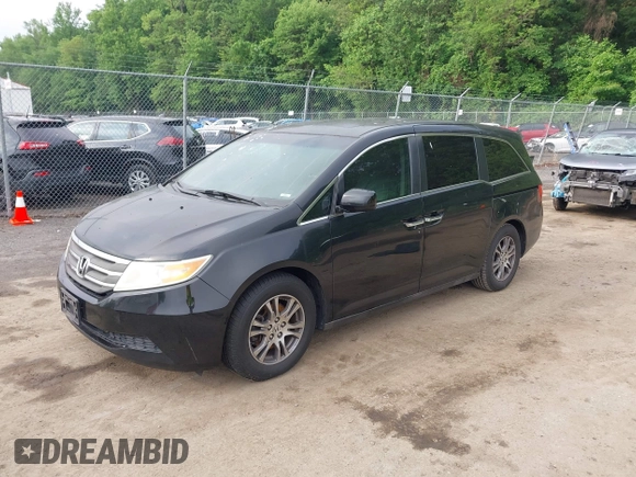 2011 Honda Odyssey EX-L with VIN 5FNRL5H68BB071178, listed as a IAAI auction lot 42286324 with 213,847 mi miles and . Bid and sale history available at DreamBid. Image 17.
