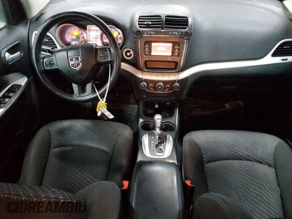 2017 Dodge Journey SXT с VIN 3C4PDDBG6HT592216, выставлен на аукционе Copart как лот 45230615 с пробегом 97 424 миль миль и Списание • Salvage title. История ставок и продаж доступна на DreamBid. Изображение 8.