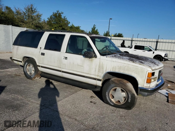 1999 GMC Suburban z VIN 3GKFK16RXXG503321, wystawiony jako Copart lot #77568614 z przebiegiem Nie podano mil oraz Czysty tytuł • Clean title. Historia ofert i sprzedaży dostępna na DreamBid. Obrazek 4.