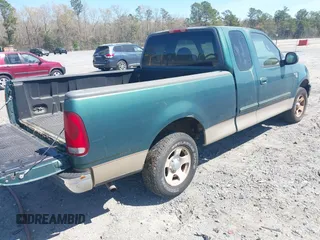 2000 Ford F-150 XL with VIN 1FTRX17L0YNA81220, listed as a IAAI auction lot 41912237 with 107,586 mi miles. Bid and sale history available at carsss.com. Image 4.