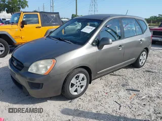 2009 Kia Rondo LX with VIN KNAFG528797267899, listed as a IAAI auction lot 42020740 with 141,113 mi miles. Bid and sale history available at carsss.com. Image 2.