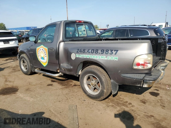 2002 Ford F-150 XL с VIN 1FTRF07202KA56864, выставлен на аукционе Copart как лот 71640724 с пробегом 165 654 миль миль и Списание • Salvage title. История ставок и продаж доступна на DreamBid. Изображение 2.