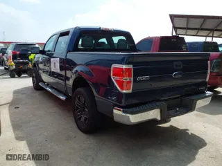 2013 Ford F-150 XL with VIN 1FTFW1CF2DKE57224, listed as a IAAI auction lot 41940686 with 148,482 mi miles. Bid and sale history available at carsss.com. Image 3.