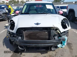 2014 MINI Countryman S with VIN WMWZC3C52EWP26869, listed as a IAAI auction lot 41756310 with 91,941 mi miles and . Bid and sale history available at DreamBid. Image 6.