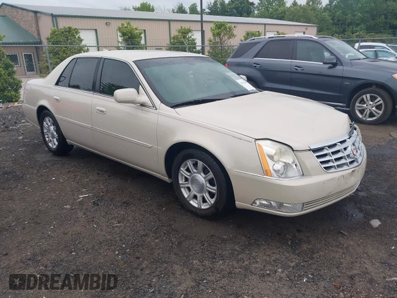 2011 Cadillac DTS z VIN 1G6KA5E65BU139507, wystawiony jako IAAI lot #42236497 z przebiegiem 118 332 mil mil oraz . Historia ofert i sprzedaży dostępna na DreamBid. Obrazek 1.