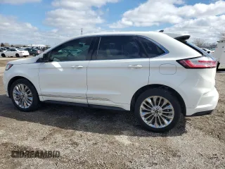 2021 Ford Edge Titanium z VIN 2FMPK4K93MBA52444, wystawiony jako Copart lot #51752835 z przebiegiem 67 137 mil mil oraz Czysty tytuł • Clean title. Historia ofert i sprzedaży dostępna na DreamBid. Obrazek 2.