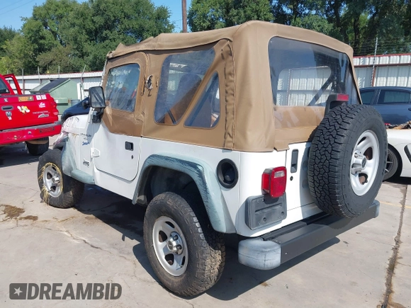 1998 Jeep Wrangler Sport z VIN 1J4FY19S3WP776209, wystawiony jako IAAI lot #42493513 z przebiegiem 113 130 mil mil oraz . Historia ofert i sprzedaży dostępna na DreamBid. Obrazek 3.