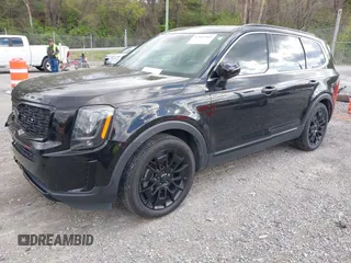 2021 Kia Telluride EX with VIN 5XYP3DHC9MG182549, listed as a IAAI auction lot 42045002 with 88,480 mi miles and . Bid and sale history available at DreamBid. Image 2.