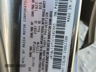 2012 Mazda 3 i Touring with VIN JM1BL1V71C1682865, listed as a Copart auction lot 52413075 with 137,098 mi miles and Salvage Title. Bid and sale history available at carsss.com. Image 13.