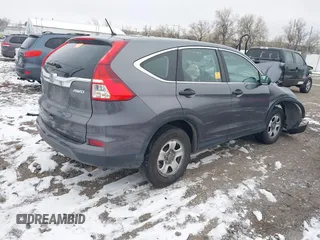 2015 Honda CR-V LX with VIN 2HKRM4H3XFH619055, listed as a IAAI auction lot 40989227 with 113,332 mi miles and . Bid and sale history available at DreamBid. Image 4.