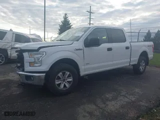 2015 Ford F-150 XLT w/HD Payload Pkg with VIN 1FTFW1EG3FFC39052, listed as a IAAI auction lot 41046847 with 151,061 mi miles. Bid and sale history available at carsss.com. Image 2.