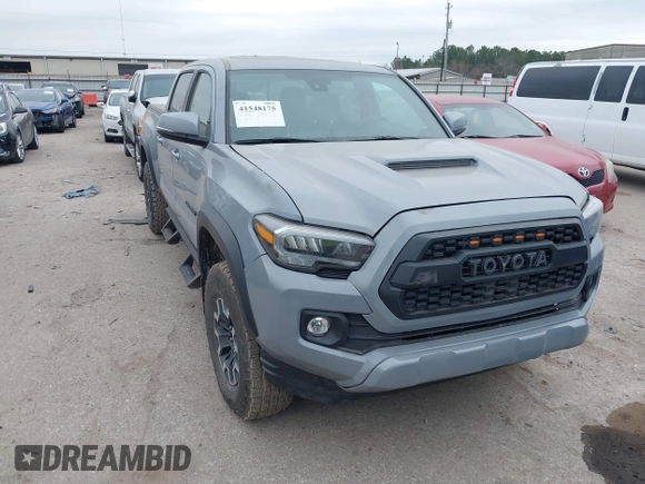 2021 Toyota Tacoma 4WD SR5 with VIN 3TMDZ5BN5MM116584, listed as a IAAI auction lot 41548175 with 23,031 mi miles. Bid and sale history available at carsss.com. Image 1.