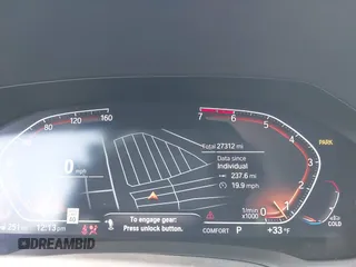2022 BMW 4 Series 430i xDrive with VIN WBA73AP09NCJ28175, listed as a IAAI auction lot 41486064 with 27,312 mi miles and . Bid and sale history available at DreamBid. Image 7.