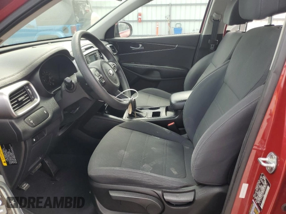 2017 Kia Sorento LX z VIN 5XYPG4A38HG237626, wystawiony jako Copart lot #57173035 z przebiegiem 141 417 mil mil oraz Szkoda całkowita • Salvage title. Historia ofert i sprzedaży dostępna na DreamBid. Obrazek 7.