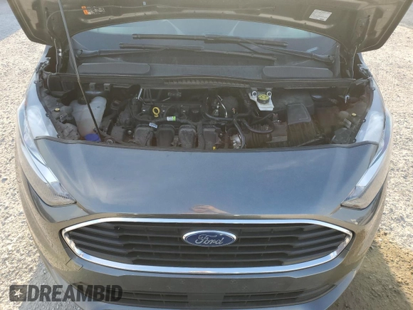 2021 Ford Transit Connect XLT with VIN NM0GS9F21M1487521, listed as a Copart auction lot 53732695 with 58,187 mi miles and Salvage title. Bid and sale history available at DreamBid. Image 11.