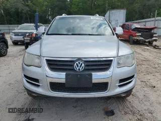 2008 Volkswagen Touareg V6 z VIN WVGBE77L98D003580, wystawiony jako Copart lot #52444235 z przebiegiem 150 876 mil mil oraz Szkoda całkowita • Salvage title. Historia ofert i sprzedaży dostępna na DreamBid. Obrazek 5.