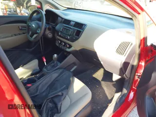 2014 Kia Rio LX with VIN KNADM4A35E6327324, listed as a IAAI auction lot 41893805 with 129,330 mi miles. Bid and sale history available at carsss.com. Image 5.