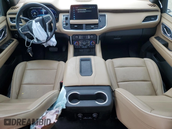2022 Chevrolet Suburban Premier with VIN 1GNSKFKTXNR303536, listed as a Copart auction lot 79192484 with 67,989 mi miles and Salvage Title. Bid and sale history available at DreamBid. Image 8.