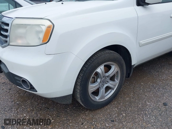 2015 Honda Pilot EX-L with VIN 5FNYF4H56FB061663, listed as a IAAI auction lot 41873152 with 211,876 mi miles and . Bid and sale history available at carsss.com. Image 21.