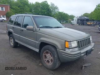 1998 Jeep Grand Cherokee Limited with VIN 1J4GZ78Y5WC261391, listed as a IAAI auction lot 42275913 with 180,552 mi miles and . Bid and sale history available at DreamBid. Image 1.