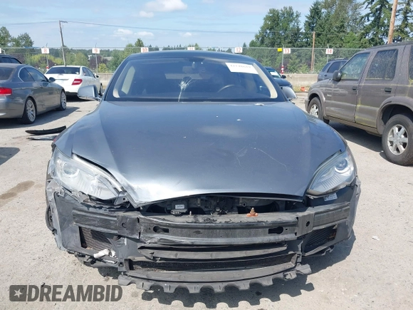 2014 Tesla Model S 60 with VIN 5YJSA1H18EFP38078, listed as a IAAI auction lot 42748619 with 159,285 mi miles and . Bid and sale history available at DreamBid. Image 12.